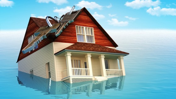 bigstock-House-sinking-in-water-55899623