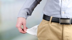 bigstock-Man-showing-his-empty-pocket-o-56916557