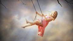 52463__joyful-girl-on-a-swing_p